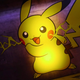 Pikachu, seen in a car commercial, sparks a bit of electricity.